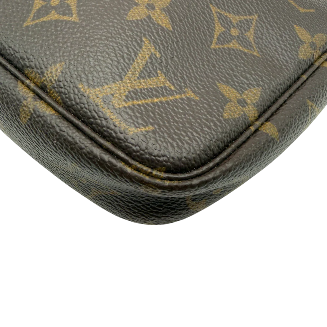 https://cdn.shopify.com/s/files/1/0564/9376/8855/files/Louis_Vuitton_Pochette_Accessoires_monogram_braun_vintage_LV8192.webp?v=1780408591