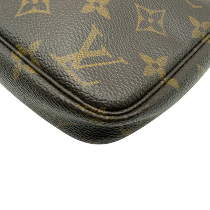 https://cdn.shopify.com/s/files/1/0564/9376/8855/files/Louis_Vuitton_Pochette_Accessoires_monogram_braun_vintage_LV8192.webp?v=1780408591