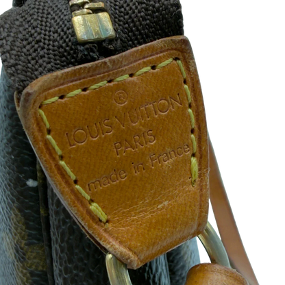 https://cdn.shopify.com/s/files/1/0564/9376/8855/files/Louis_Vuitton_Pochette_Accessoires_monogram_braun_vintage_LV8196.webp?v=1780408591