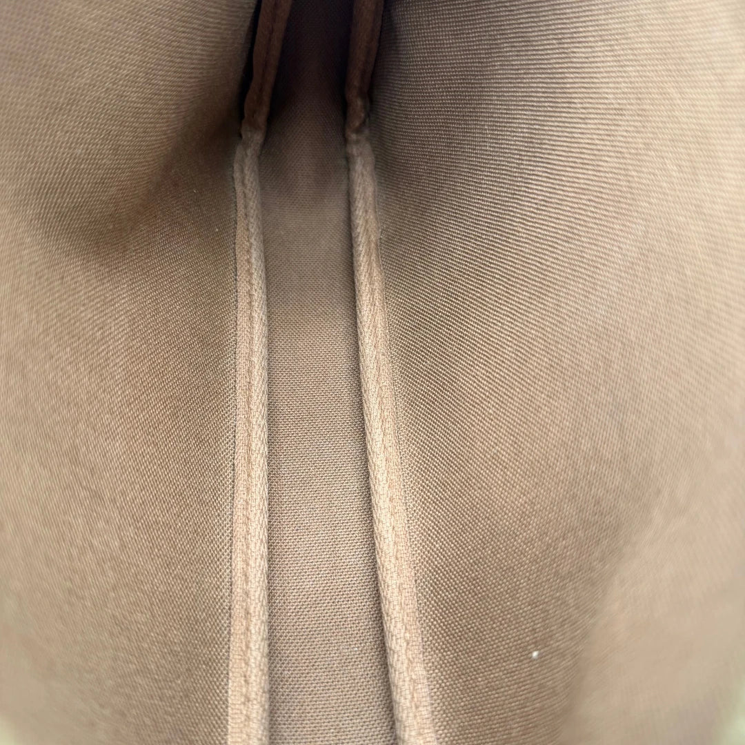 https://cdn.shopify.com/s/files/1/0564/9376/8855/files/Louis_Vuitton_Pochette_Accessoires_monogram_braun_vintage_LV8522.webp?v=1781108154