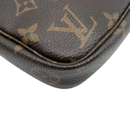 https://cdn.shopify.com/s/files/1/0564/9376/8855/files/Louis_Vuitton_Pochette_Accessoires_monogram_braun_vintage_LV8531.webp?v=1781108265