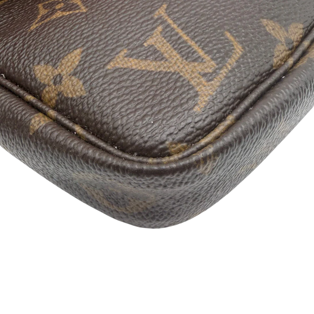 https://cdn.shopify.com/s/files/1/0564/9376/8855/files/Louis_Vuitton_Pochette_Accessoires_monogram_braun_vintage_LV8533.webp?v=1781108265