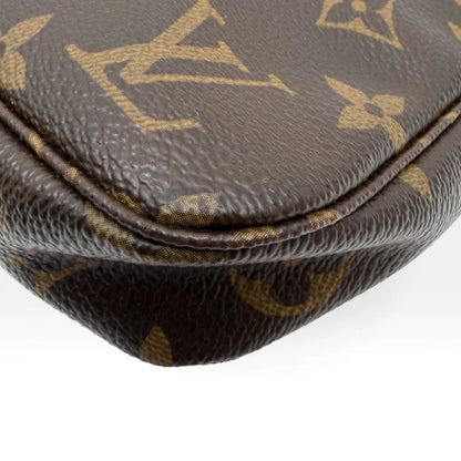https://cdn.shopify.com/s/files/1/0564/9376/8855/files/Louis_Vuitton_Pochette_Accessoires_monogram_braun_vintage_LV_4407.webp?v=1765402243
