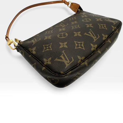 https://cdn.shopify.com/s/files/1/0564/9376/8855/files/Louis_Vuitton_Pochette_Accessoires_monogram_braun_vintage_LV_5131.webp?v=1765382732