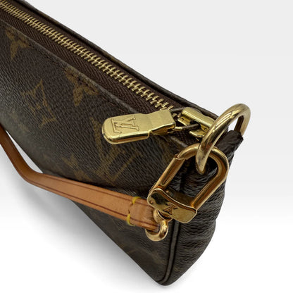 https://cdn.shopify.com/s/files/1/0564/9376/8855/files/Louis_Vuitton_Pochette_Accessoires_monogram_braun_vintage_LV_5736.webp?v=1765451302