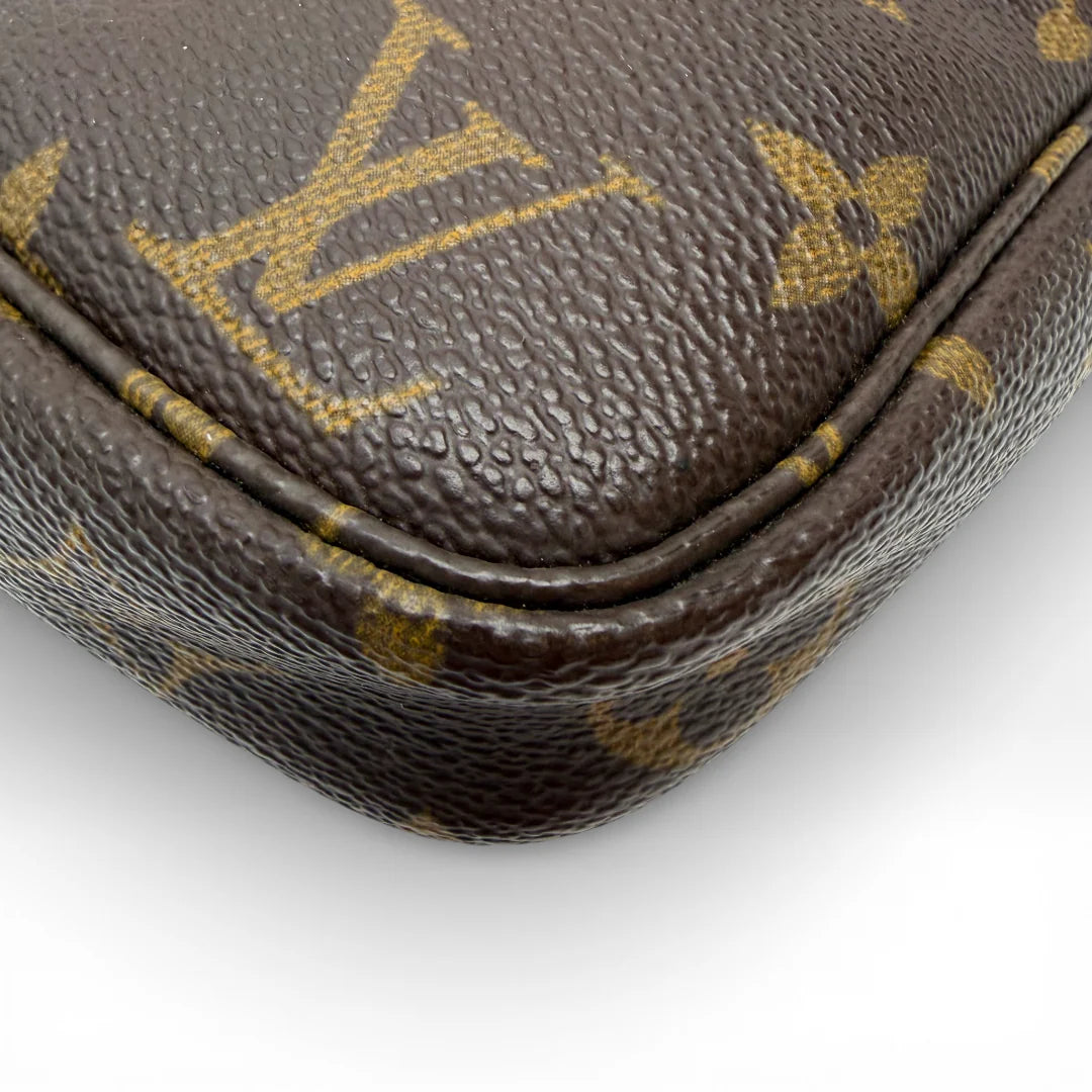 https://cdn.shopify.com/s/files/1/0564/9376/8855/files/Louis_Vuitton_Pochette_Accessoires_monogram_braun_vintage_LV_8305.webp?v=1768418127