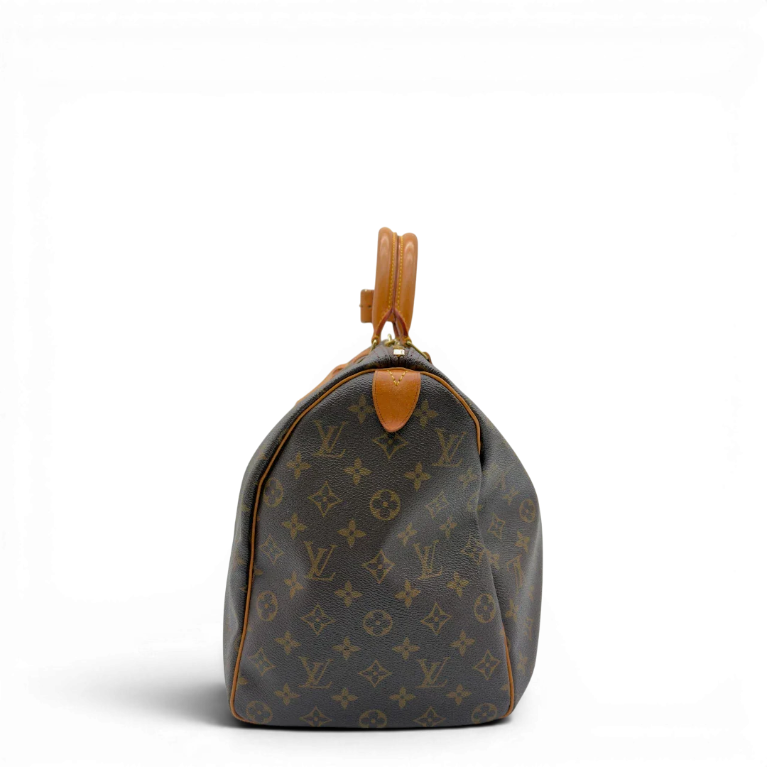 https://cdn.shopify.com/s/files/1/0564/9376/8855/files/Louis_Vuitton_Reisetasche_Keepall_45_monogram_braun_vintage_LV8363.webp?v=1780488446