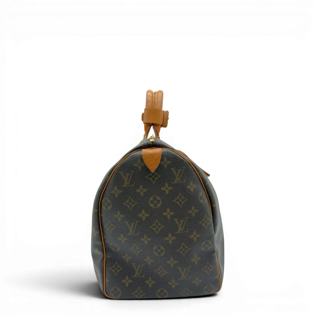 https://cdn.shopify.com/s/files/1/0564/9376/8855/files/Louis_Vuitton_Reisetasche_Keepall_45_monogram_braun_vintage_LV8365.webp?v=1780488445