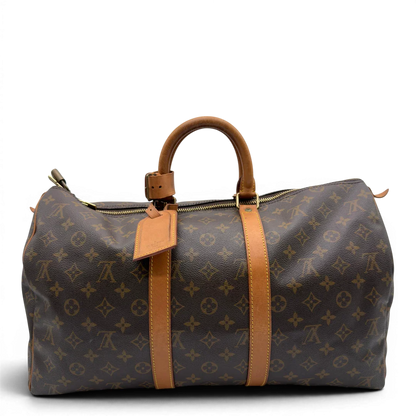 https://cdn.shopify.com/s/files/1/0564/9376/8855/files/Louis_Vuitton_Reisetasche_Keepall_45_monogram_braun_vintage_LV8379.webp?v=1780488245