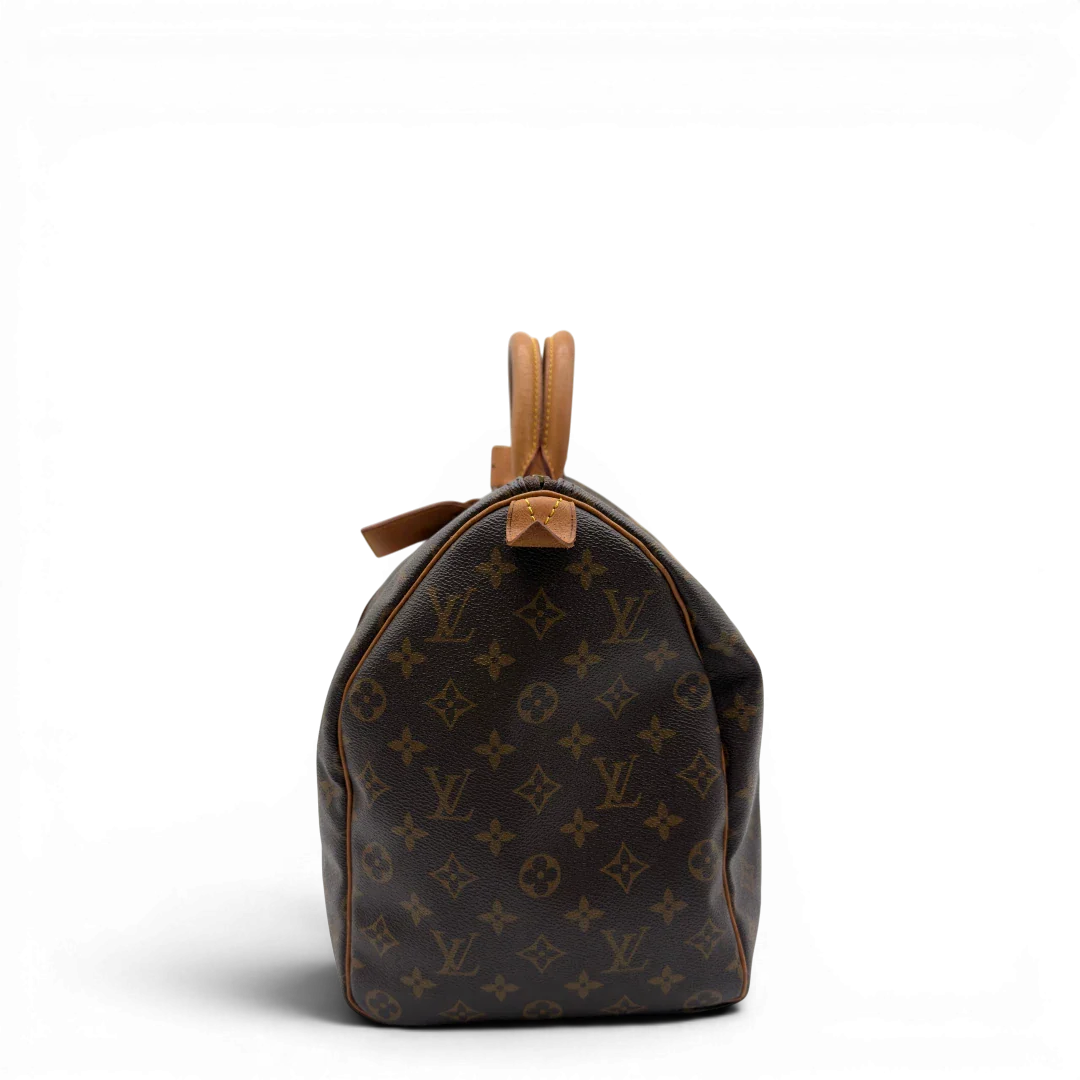 https://cdn.shopify.com/s/files/1/0564/9376/8855/files/Louis_Vuitton_Reisetasche_Keepall_45_monogram_braun_vintage_LV8381.webp?v=1780488245