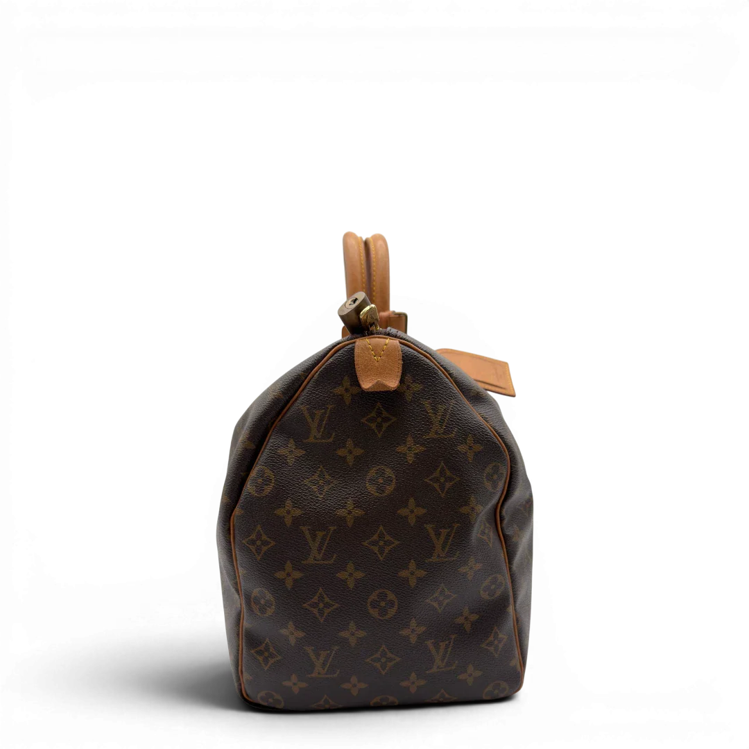 https://cdn.shopify.com/s/files/1/0564/9376/8855/files/Louis_Vuitton_Reisetasche_Keepall_45_monogram_braun_vintage_LV8382.webp?v=1780488245