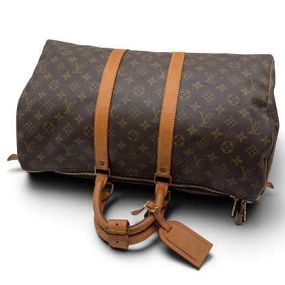 https://cdn.shopify.com/s/files/1/0564/9376/8855/files/Louis_Vuitton_Reisetasche_Keepall_45_monogram_braun_vintage_LV8388.webp?v=1780488245