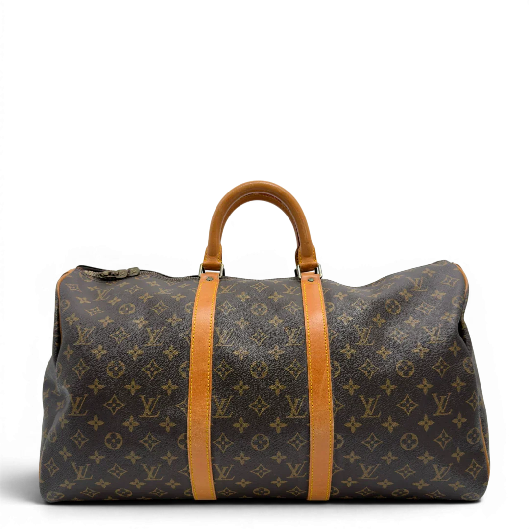 https://cdn.shopify.com/s/files/1/0564/9376/8855/files/Louis_Vuitton_Reisetasche_Keepall_50_monogram_braun_vintage_LV7738.webp?v=1779405988