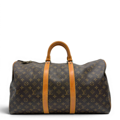 https://cdn.shopify.com/s/files/1/0564/9376/8855/files/Louis_Vuitton_Reisetasche_Keepall_50_monogram_braun_vintage_LV7738.webp?v=1779405988