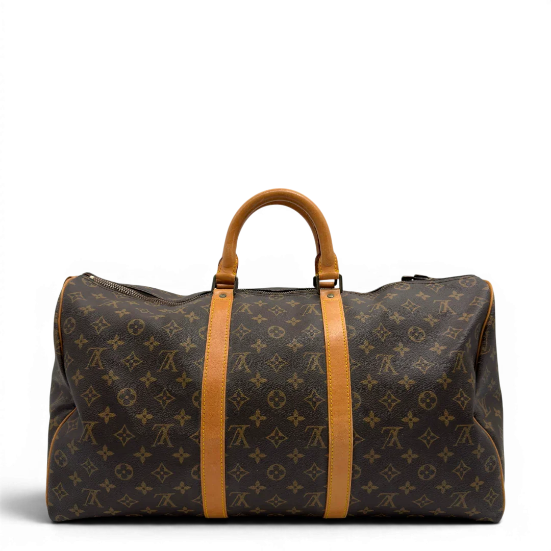https://cdn.shopify.com/s/files/1/0564/9376/8855/files/Louis_Vuitton_Reisetasche_Keepall_50_monogram_braun_vintage_LV7739.webp?v=1779405988