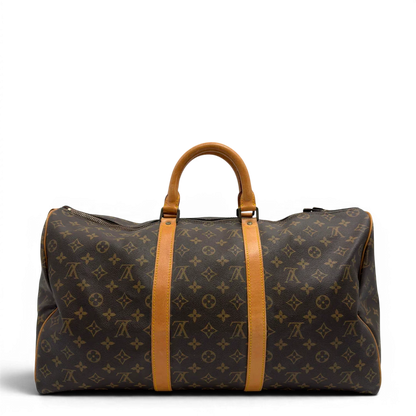 https://cdn.shopify.com/s/files/1/0564/9376/8855/files/Louis_Vuitton_Reisetasche_Keepall_50_monogram_braun_vintage_LV7739.webp?v=1779405988