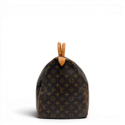 https://cdn.shopify.com/s/files/1/0564/9376/8855/files/Louis_Vuitton_Reisetasche_Keepall_50_monogram_braun_vintage_LV7740.webp?v=1779405988