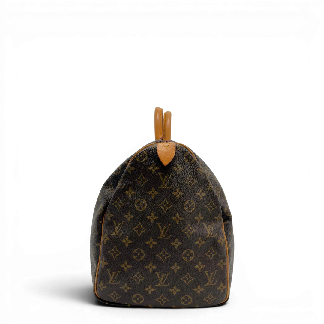 https://cdn.shopify.com/s/files/1/0564/9376/8855/files/Louis_Vuitton_Reisetasche_Keepall_50_monogram_braun_vintage_LV7741.webp?v=1779405988