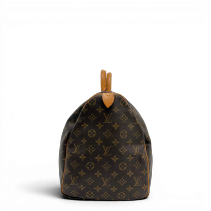 https://cdn.shopify.com/s/files/1/0564/9376/8855/files/Louis_Vuitton_Reisetasche_Keepall_50_monogram_braun_vintage_LV7741.webp?v=1779405988
