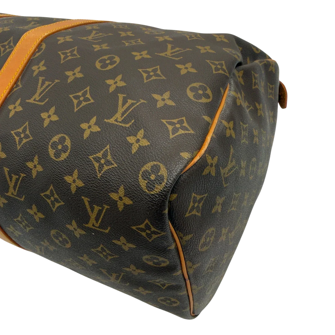 https://cdn.shopify.com/s/files/1/0564/9376/8855/files/Louis_Vuitton_Reisetasche_Keepall_50_monogram_braun_vintage_LV7743.webp?v=1779405988
