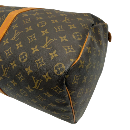 https://cdn.shopify.com/s/files/1/0564/9376/8855/files/Louis_Vuitton_Reisetasche_Keepall_50_monogram_braun_vintage_LV7743.webp?v=1779405988
