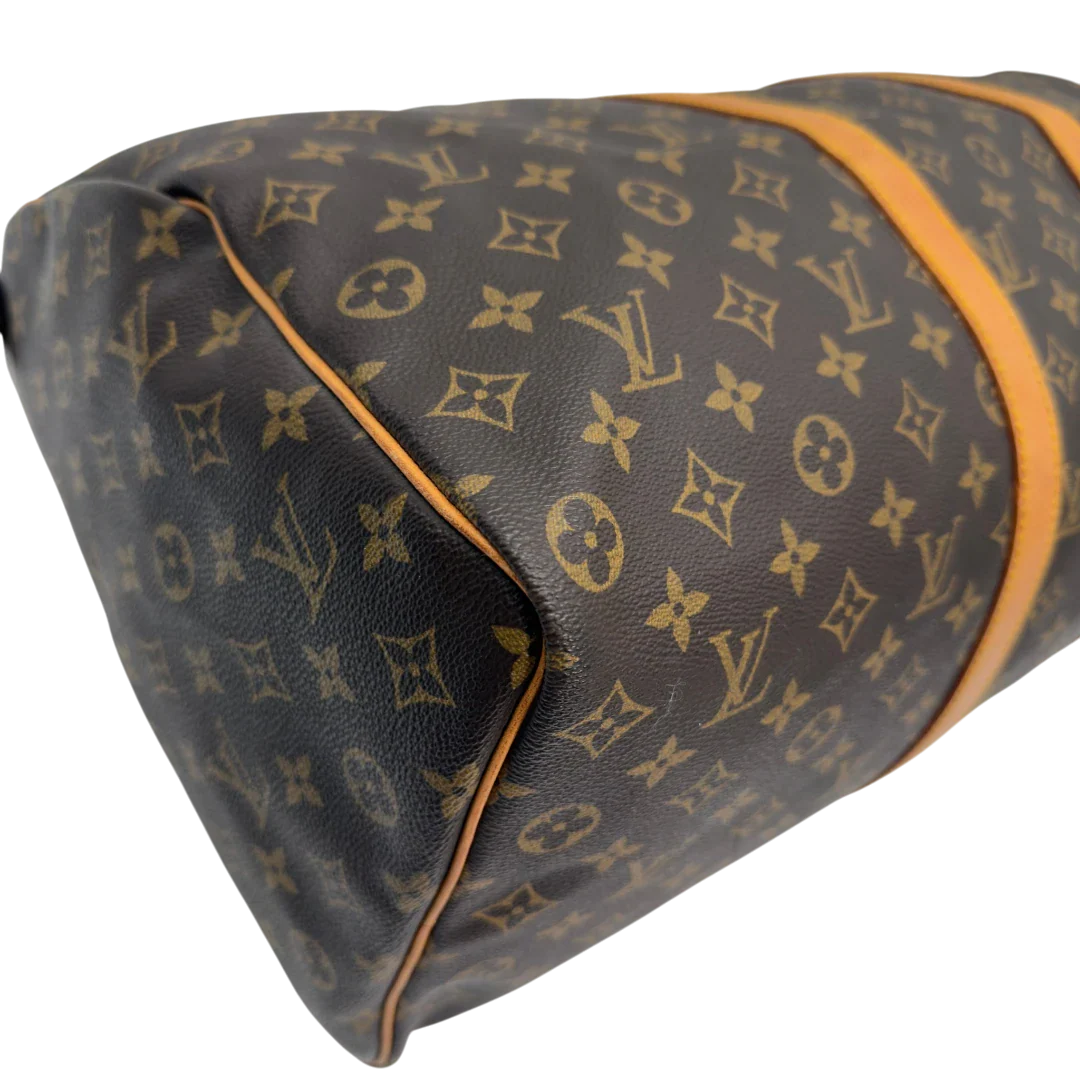 https://cdn.shopify.com/s/files/1/0564/9376/8855/files/Louis_Vuitton_Reisetasche_Keepall_50_monogram_braun_vintage_LV7744.webp?v=1779405988