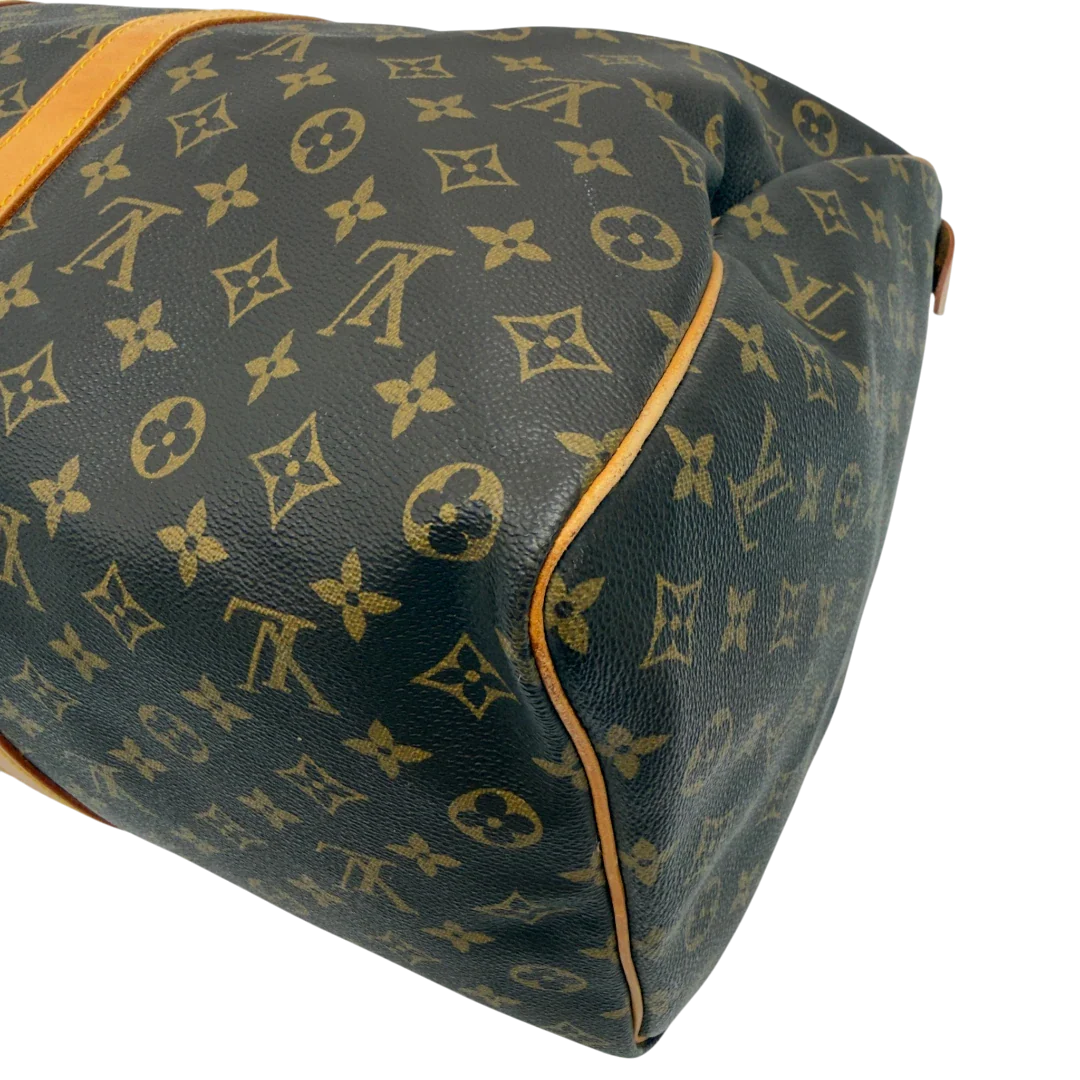 https://cdn.shopify.com/s/files/1/0564/9376/8855/files/Louis_Vuitton_Reisetasche_Keepall_50_monogram_braun_vintage_LV7745.webp?v=1779405988