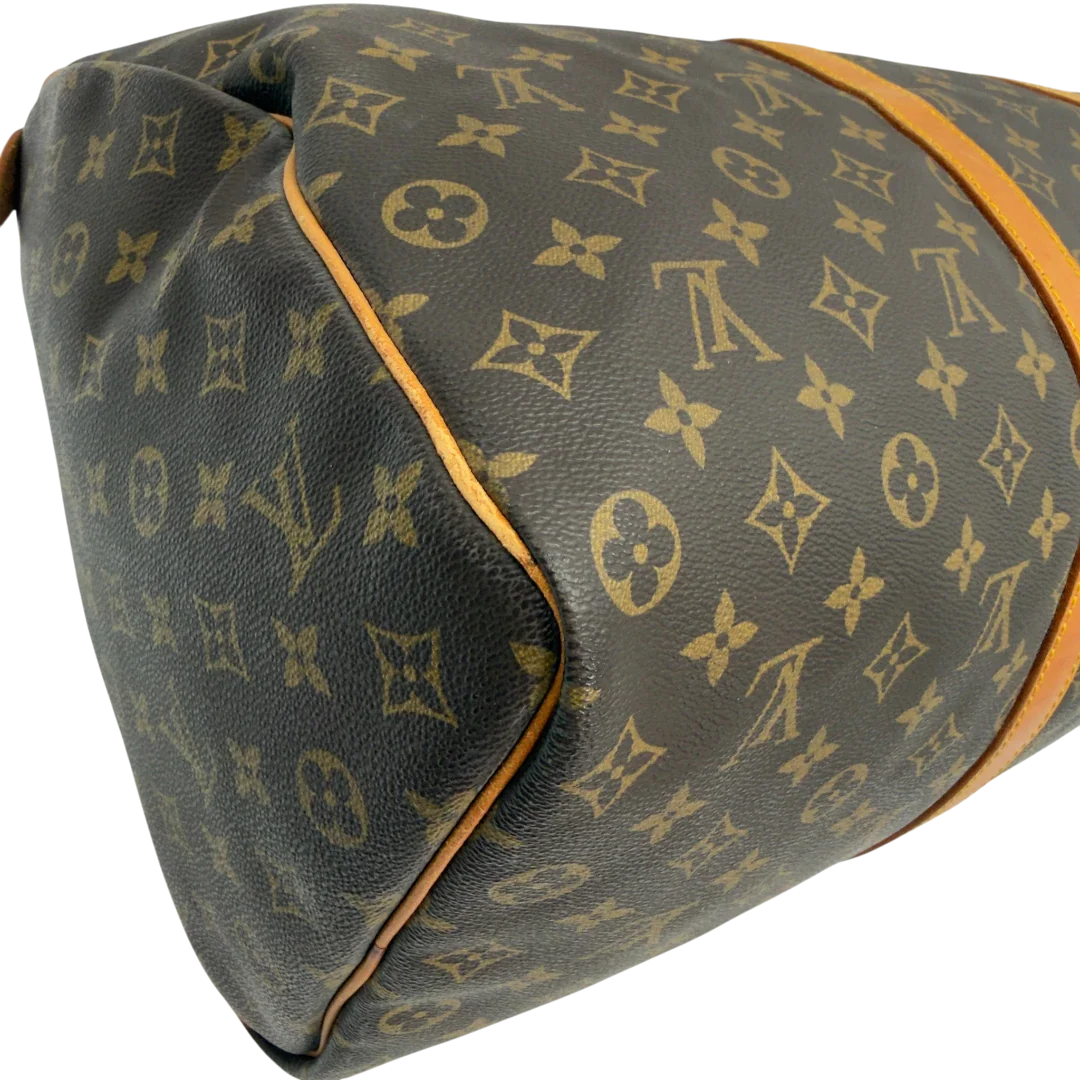 https://cdn.shopify.com/s/files/1/0564/9376/8855/files/Louis_Vuitton_Reisetasche_Keepall_50_monogram_braun_vintage_LV7746.webp?v=1779405988