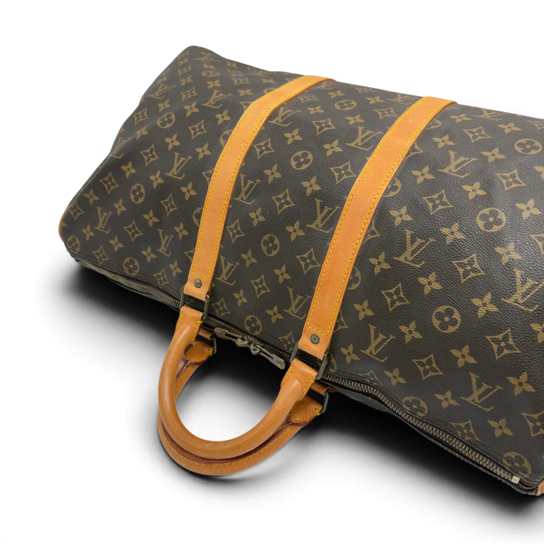https://cdn.shopify.com/s/files/1/0564/9376/8855/files/Louis_Vuitton_Reisetasche_Keepall_50_monogram_braun_vintage_LV7747.webp?v=1779405988