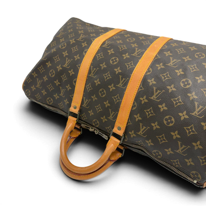 https://cdn.shopify.com/s/files/1/0564/9376/8855/files/Louis_Vuitton_Reisetasche_Keepall_50_monogram_braun_vintage_LV7747.webp?v=1779405988