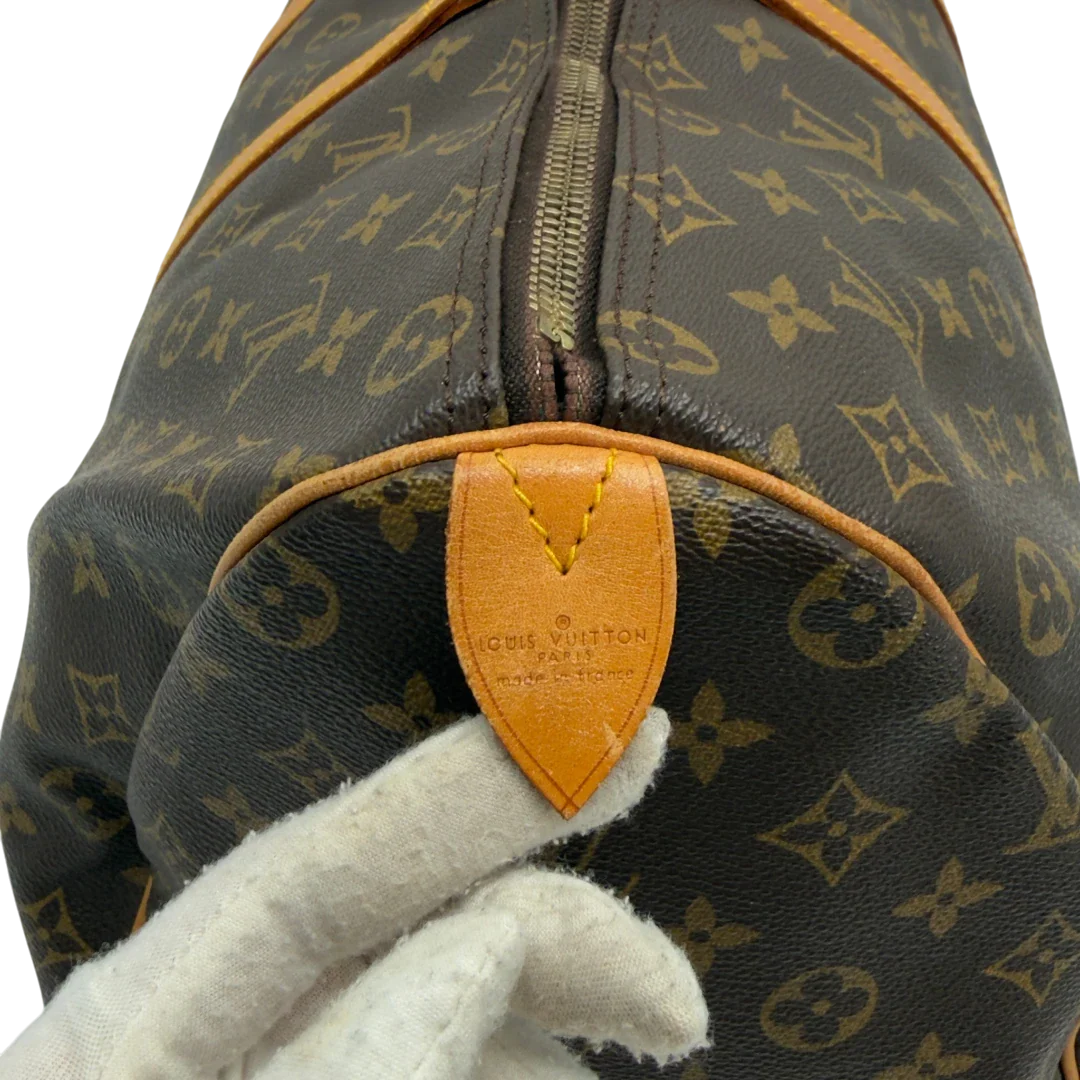 https://cdn.shopify.com/s/files/1/0564/9376/8855/files/Louis_Vuitton_Reisetasche_Keepall_50_monogram_braun_vintage_LV7749.webp?v=1779405988