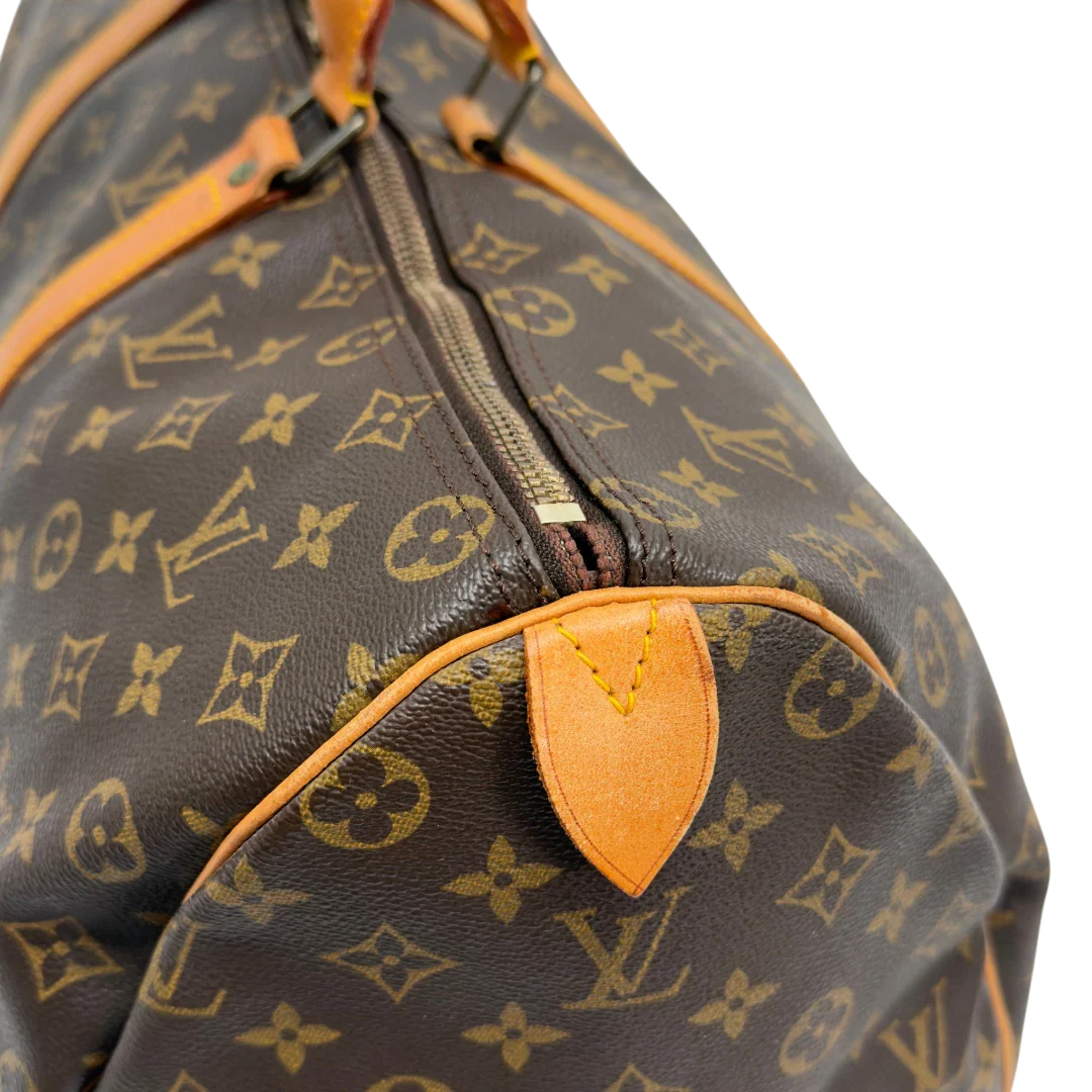 https://cdn.shopify.com/s/files/1/0564/9376/8855/files/Louis_Vuitton_Reisetasche_Keepall_50_monogram_braun_vintage_LV7750.webp?v=1779405988