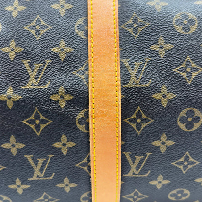 https://cdn.shopify.com/s/files/1/0564/9376/8855/files/Louis_Vuitton_Reisetasche_Keepall_50_monogram_braun_vintage_LV7753.webp?v=1779405989