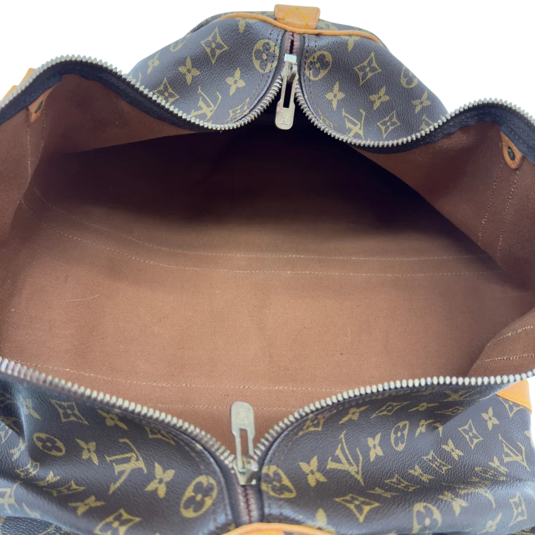 https://cdn.shopify.com/s/files/1/0564/9376/8855/files/Louis_Vuitton_Reisetasche_Keepall_50_monogram_braun_vintage_LV7756.webp?v=1779405988
