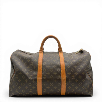 https://cdn.shopify.com/s/files/1/0564/9376/8855/files/Louis_Vuitton_Reisetasche_Keepall_50_monogram_braun_vintage_LV_1424.webp?v=1772710314
