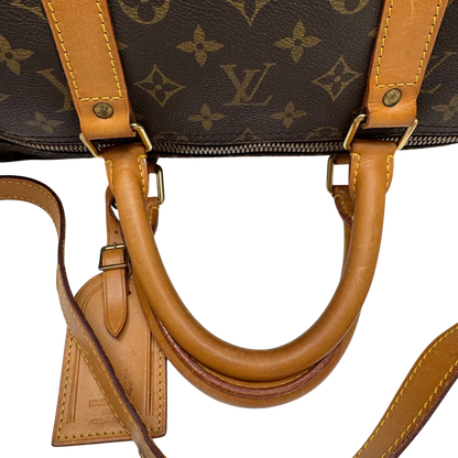 https://cdn.shopify.com/s/files/1/0564/9376/8855/files/Louis_Vuitton_Reisetasche_Keepall_55_Bandouliere_monogram_braun_10.webp?v=1783515514