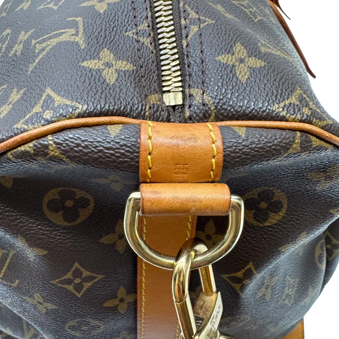 https://cdn.shopify.com/s/files/1/0564/9376/8855/files/Louis_Vuitton_Reisetasche_Keepall_55_Bandouliere_monogram_braun_17.webp?v=1783515514