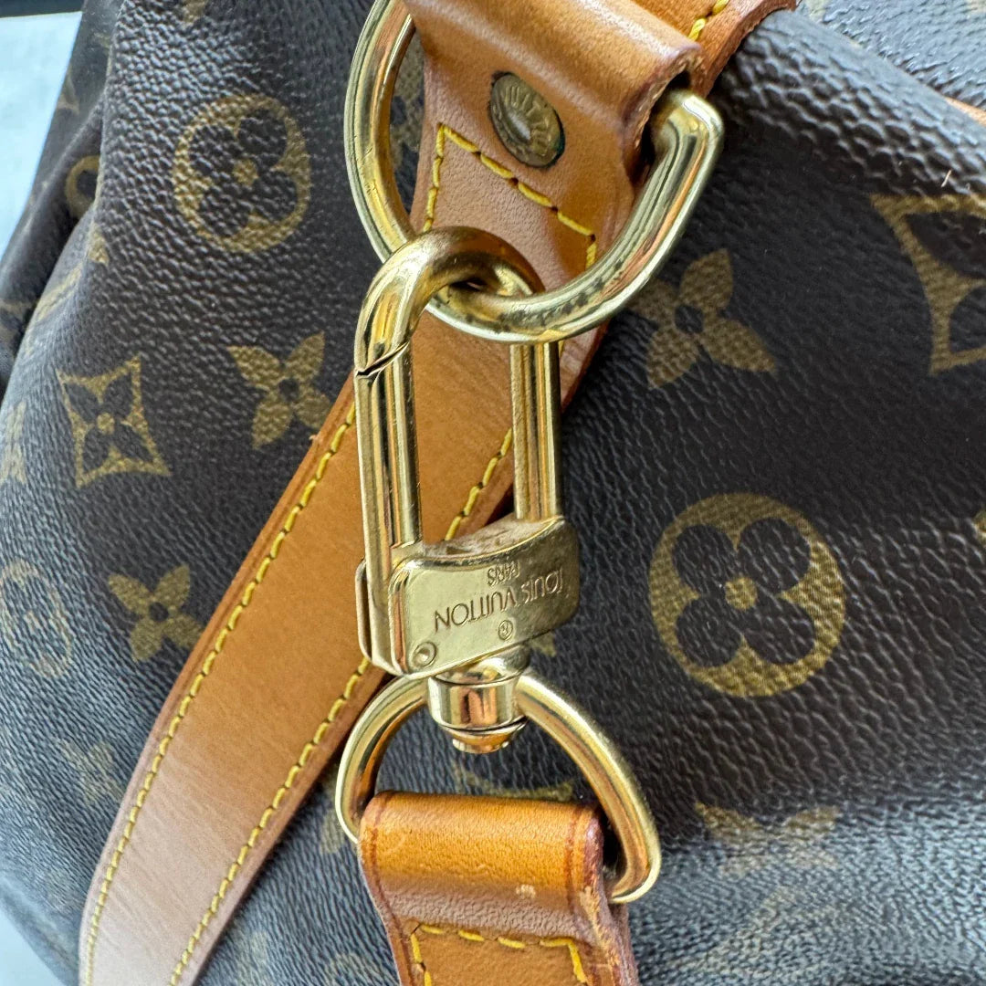 https://cdn.shopify.com/s/files/1/0564/9376/8855/files/Louis_Vuitton_Reisetasche_Keepall_55_Bandouliere_monogram_braun_19.webp?v=1783515515