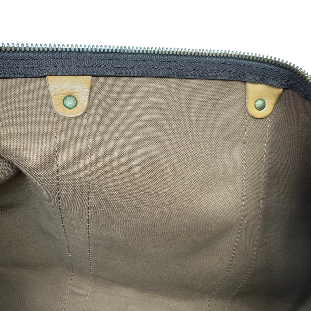 https://cdn.shopify.com/s/files/1/0564/9376/8855/files/Louis_Vuitton_Reisetasche_Keepall_55_Bandouliere_monogram_braun_24.webp?v=1783515514