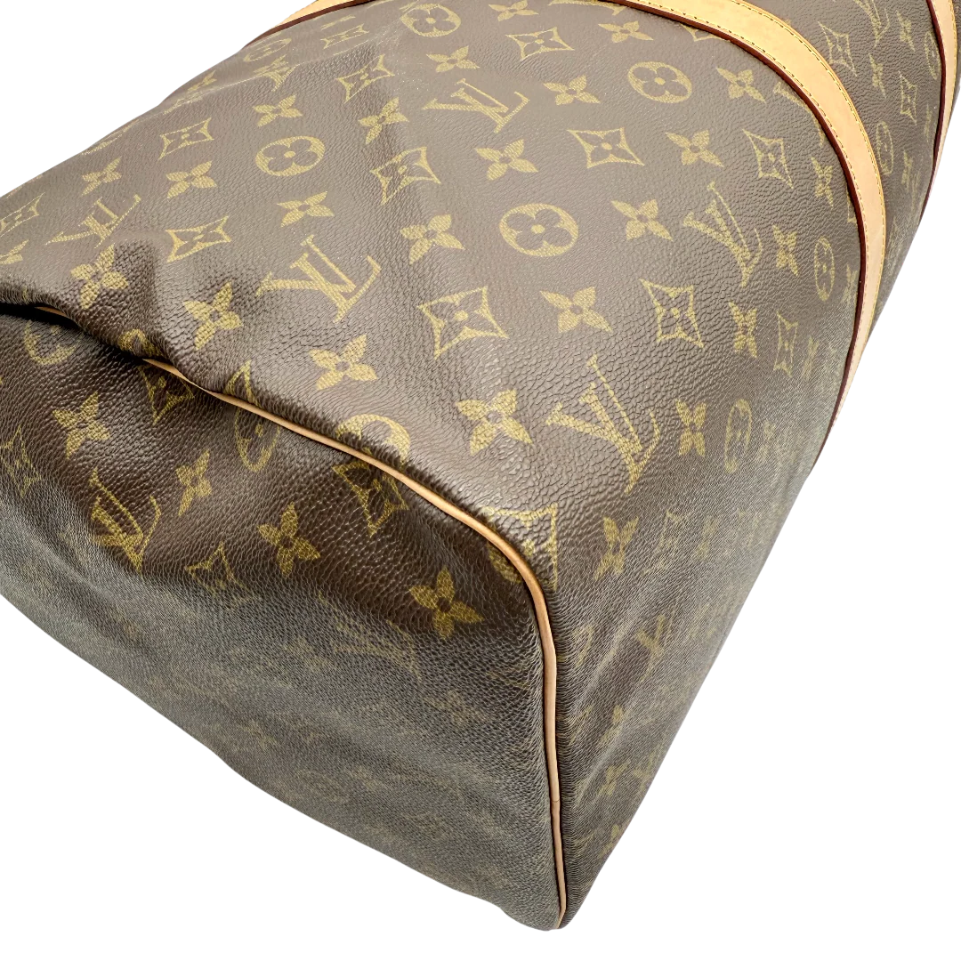https://cdn.shopify.com/s/files/1/0564/9376/8855/files/Louis_Vuitton_Reisetasche_Keepall_55_monogram_braun_vintage_LV_1030.webp?v=1770890836