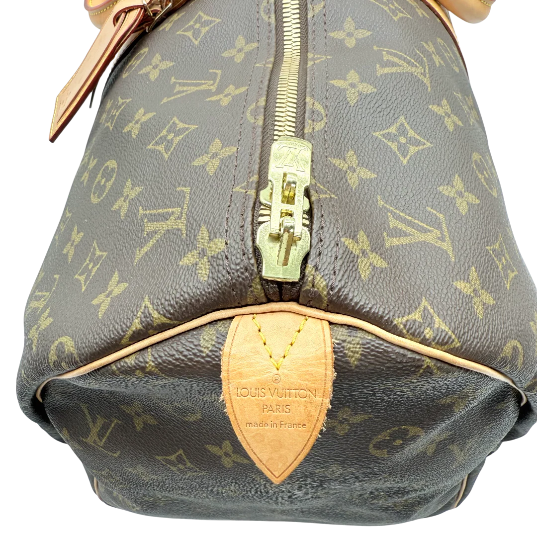 https://cdn.shopify.com/s/files/1/0564/9376/8855/files/Louis_Vuitton_Reisetasche_Keepall_55_monogram_braun_vintage_LV_1033.webp?v=1770890836