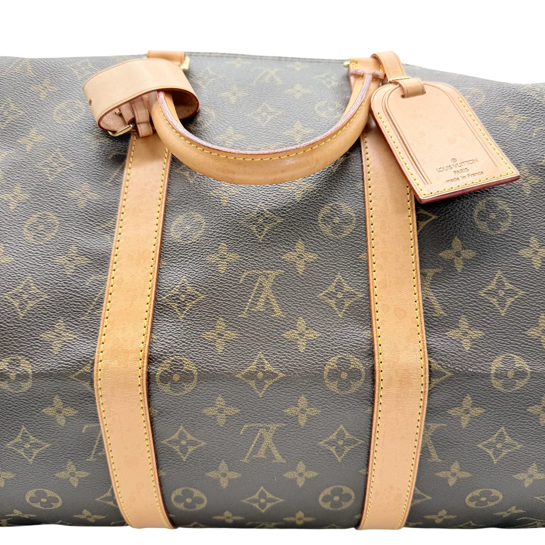 https://cdn.shopify.com/s/files/1/0564/9376/8855/files/Louis_Vuitton_Reisetasche_Keepall_55_monogram_braun_vintage_LV_1035.webp?v=1770890836