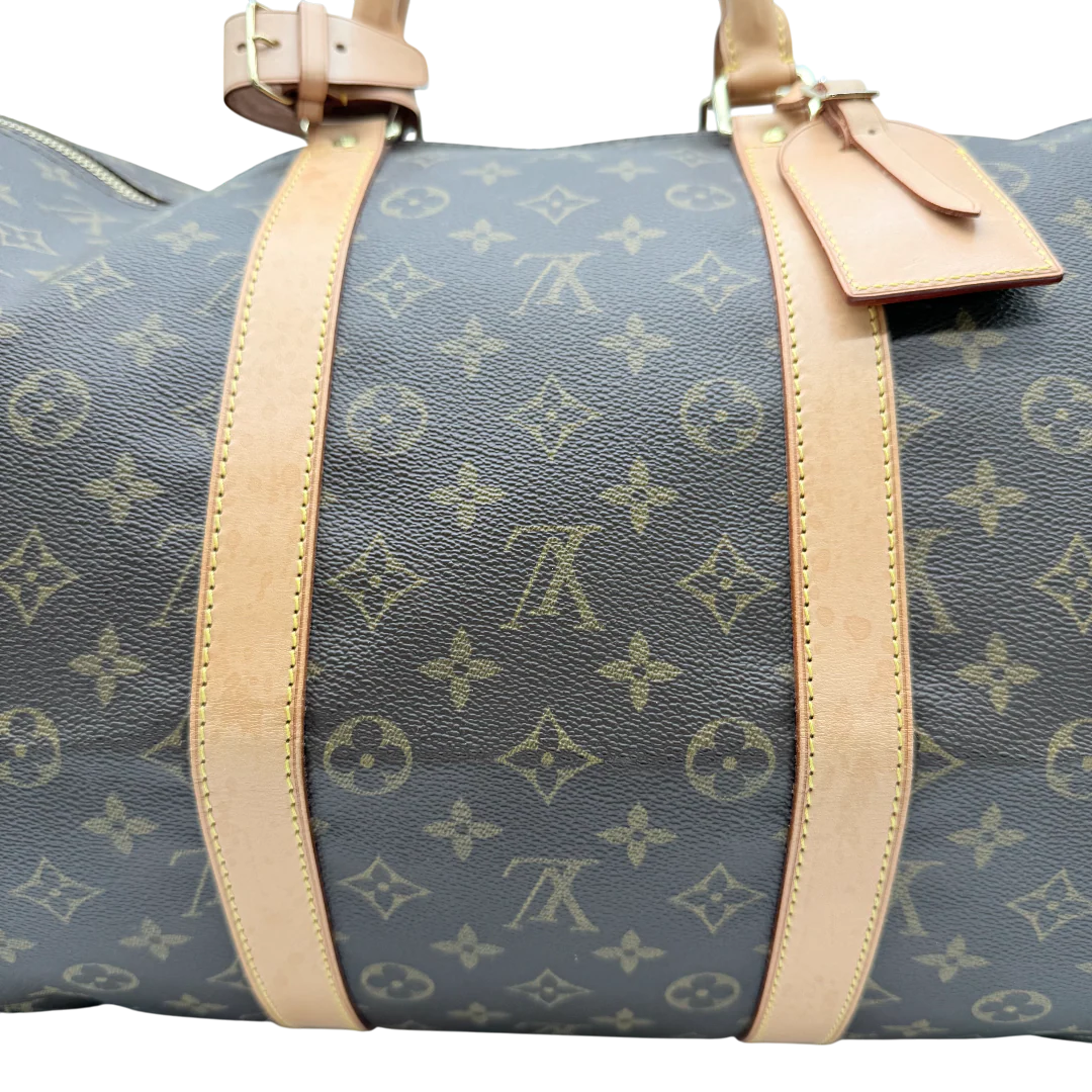 https://cdn.shopify.com/s/files/1/0564/9376/8855/files/Louis_Vuitton_Reisetasche_Keepall_55_monogram_braun_vintage_LV_1043.webp?v=1770890836