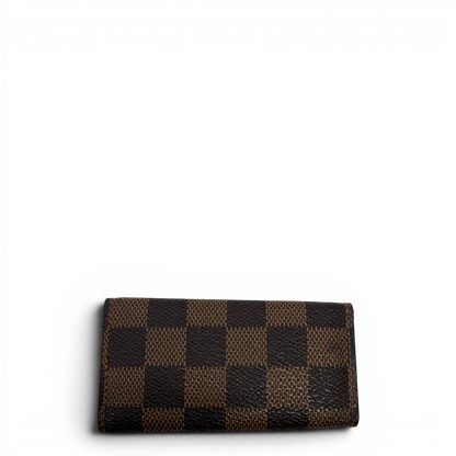 https://cdn.shopify.com/s/files/1/0564/9376/8855/files/Louis_Vuitton_Schlusseletui_Multicles_Damier_Ebene_braun_2.webp?v=1784270877