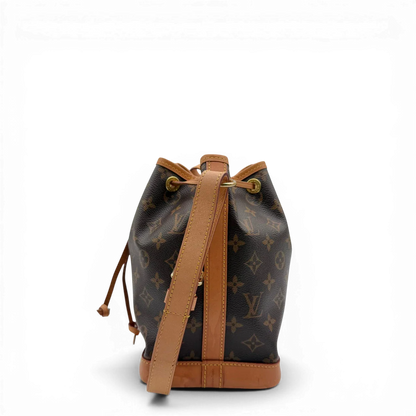 https://cdn.shopify.com/s/files/1/0564/9376/8855/files/Louis_Vuitton_Schultertasche_Sac_Noe_BB_monogram_braun_vintage_LV3564.webp?v=1774402758