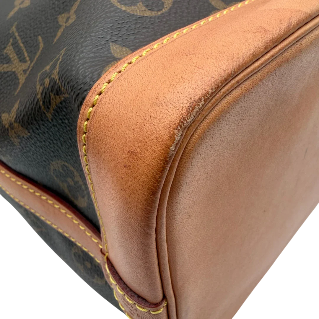 https://cdn.shopify.com/s/files/1/0564/9376/8855/files/Louis_Vuitton_Schultertasche_Sac_Noe_BB_monogram_braun_vintage_LV3568.webp?v=1774402757
