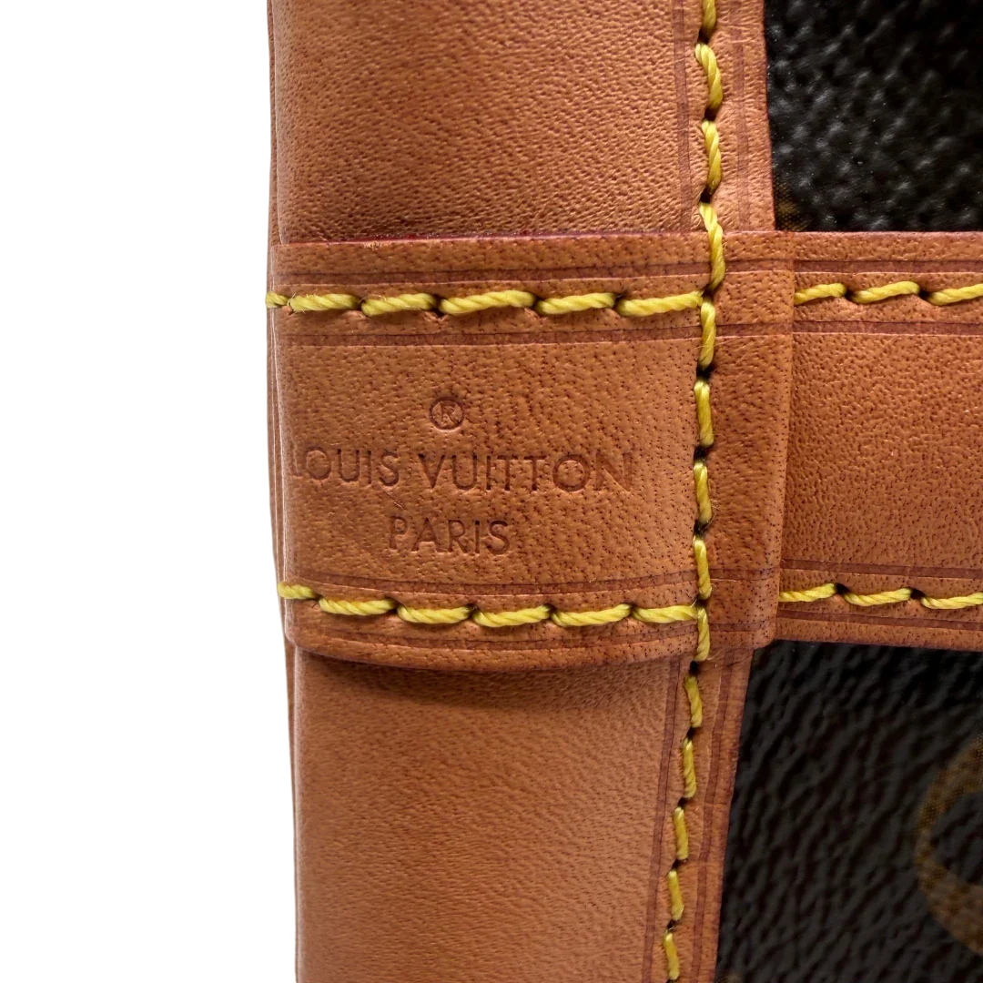 https://cdn.shopify.com/s/files/1/0564/9376/8855/files/Louis_Vuitton_Schultertasche_Sac_Noe_BB_monogram_braun_vintage_LV3576.webp?v=1774402757