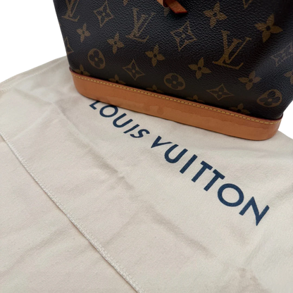 https://cdn.shopify.com/s/files/1/0564/9376/8855/files/Louis_Vuitton_Schultertasche_Sac_Noe_BB_monogram_braun_vintage_LV3580.webp?v=1774402757