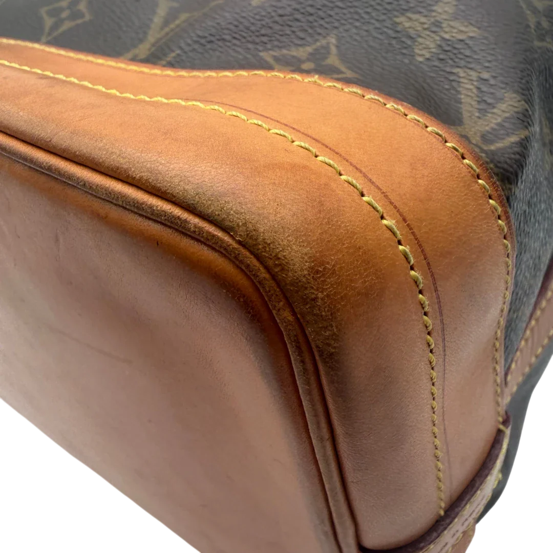 https://cdn.shopify.com/s/files/1/0564/9376/8855/files/Louis_Vuitton_Schultertasche_Sac_Noe_Grande_monogram_braun_vintage_LV6024.webp?v=1778082483