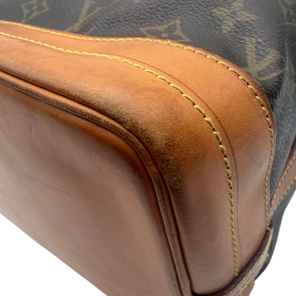 https://cdn.shopify.com/s/files/1/0564/9376/8855/files/Louis_Vuitton_Schultertasche_Sac_Noe_Grande_monogram_braun_vintage_LV6024.webp?v=1778082483